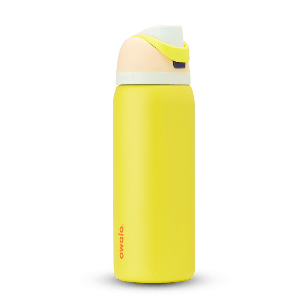 FreeSip 32oz water bottle, bright yellow body with pale cream and peach color-block flip cap