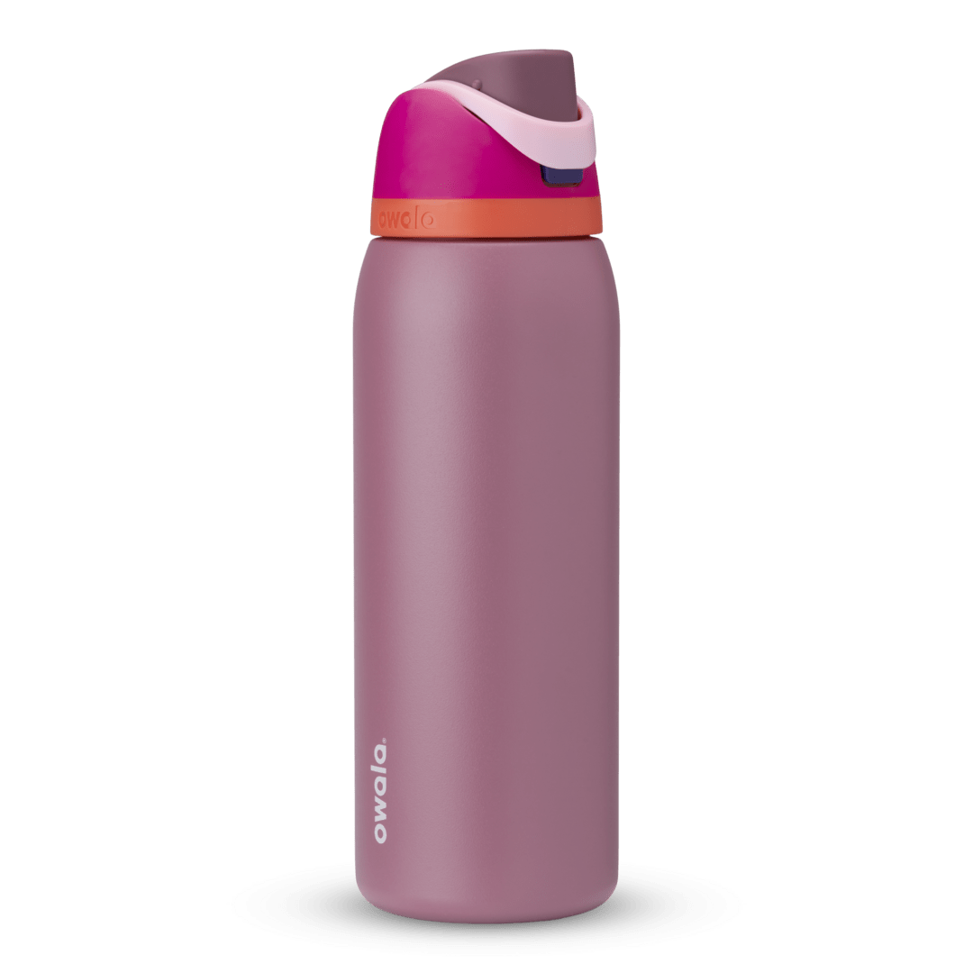 Full profile shot of the 40oz 'Crown Jewel' FreeSip water bottle in pink and mauve.