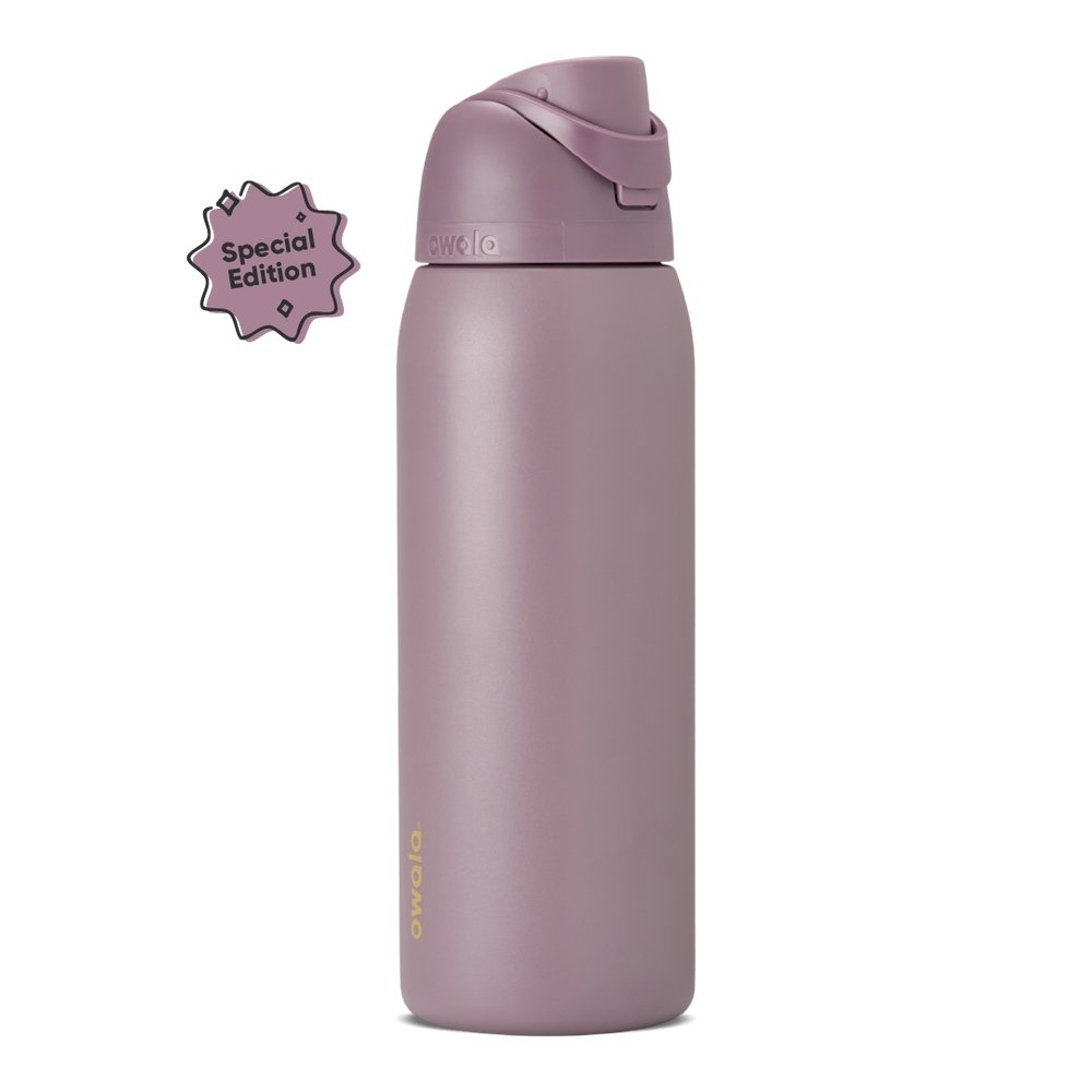 FreeSip 40oz in Spring Revival, dusty mauve-purple insulated bottle with matching flip cap and carry loop, gold Owala logo