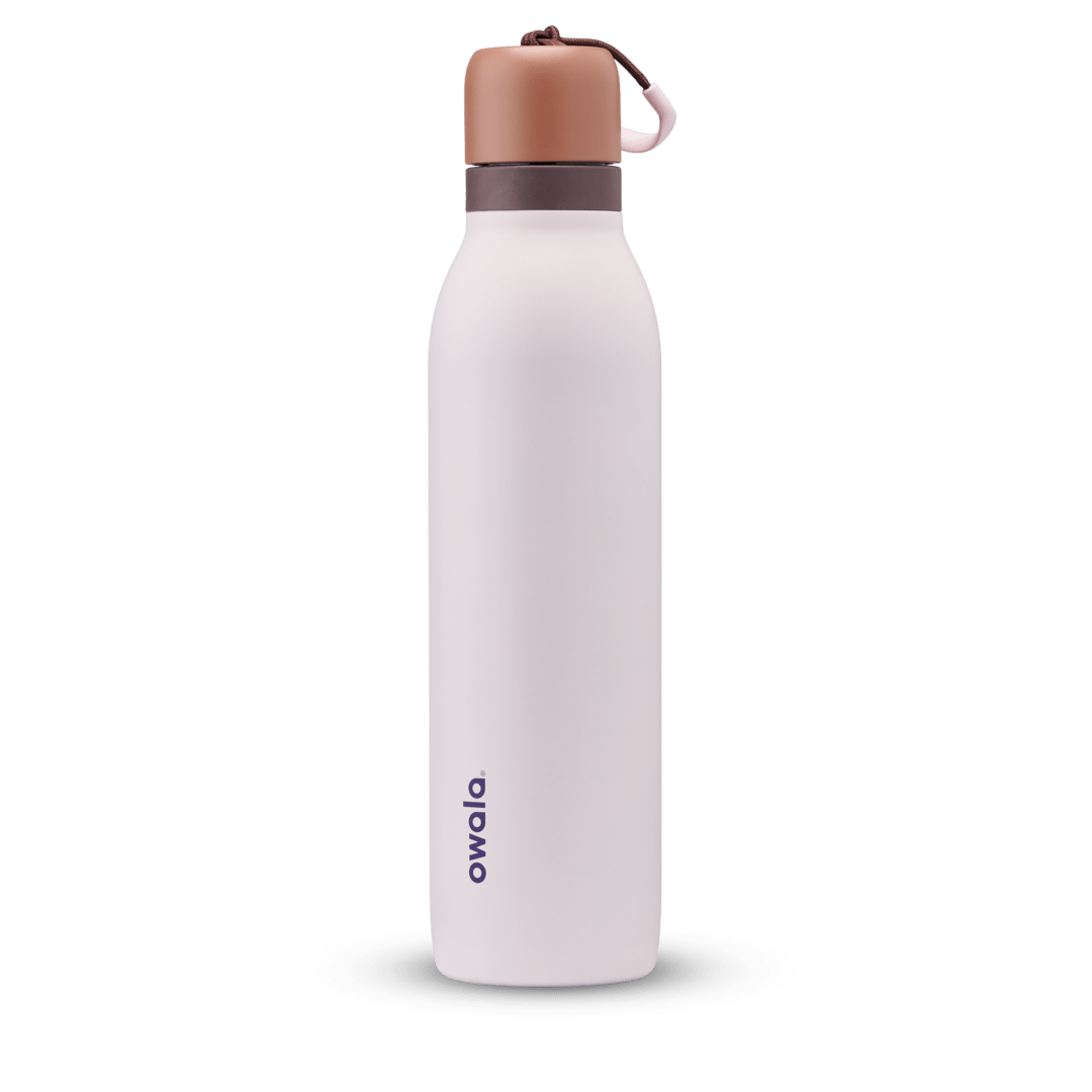 Owala white and brown 24oz FreeSip Twist water bottle.