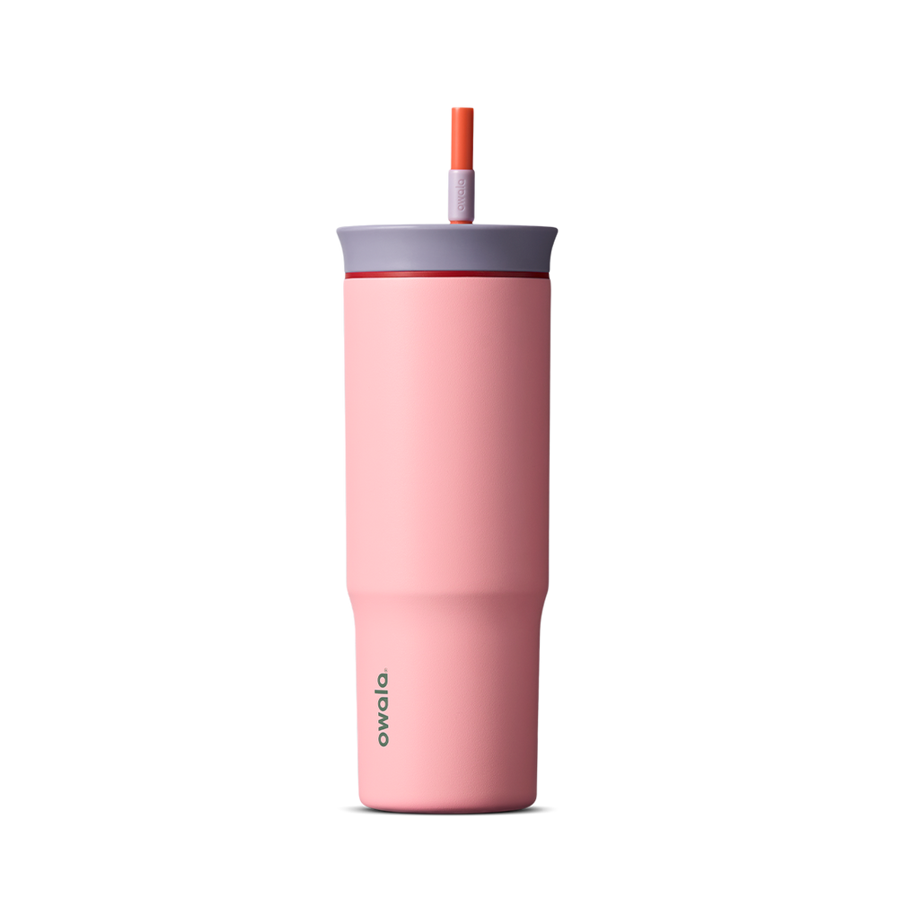 24oz Tumbler in Sugar High; matte coral-pink insulated tumbler with lavender-gray lid and orange-red straw, Owala wordmark on front