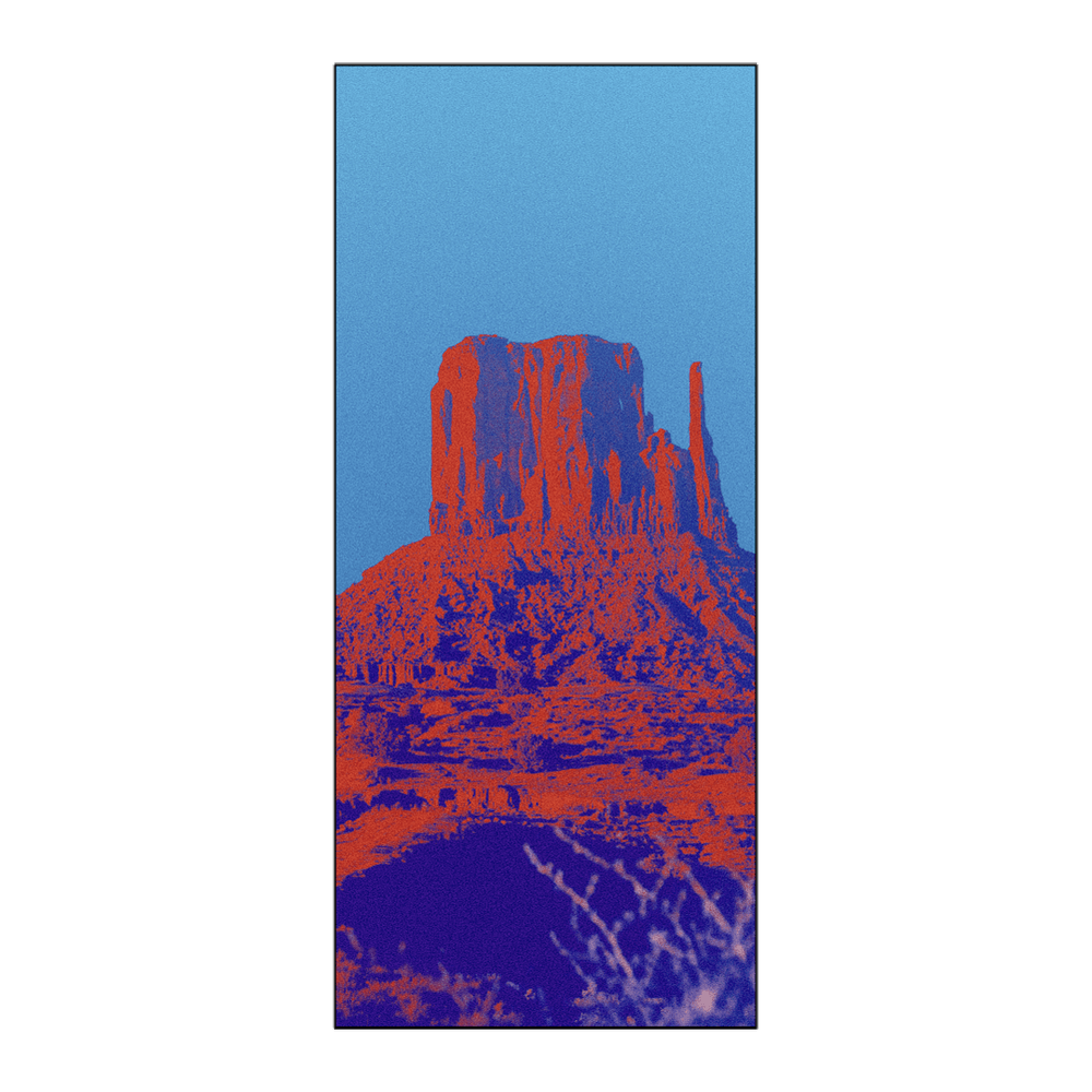 Owala Beach Towel in Wild Wild West; vibrant pop-art red and orange desert rock formation print on a bright blue background